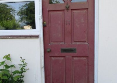Front door looking tired and in need of replacing - see the great results that can be achieved with a fresh coat of paint 2
